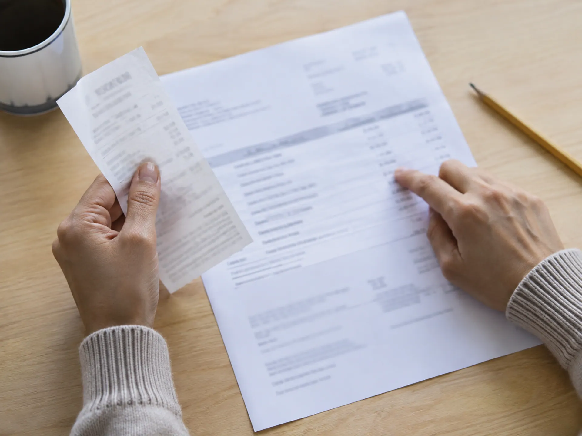 A buyer comparing an earlier deposit receipt with closing paperwork